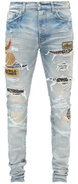 AMIRI BIKER PATCH DISTRESSED SKINNY JEANS